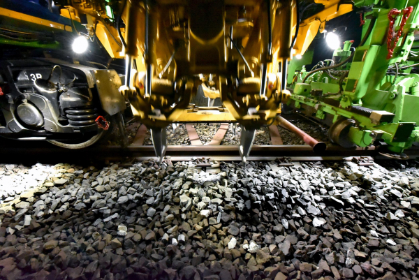 Adjusted tamping unit in a track with Y-steel sleepers.