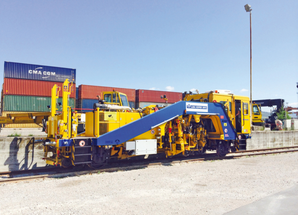 Luka Koper INPO operates a tamping machine to maintain the extensive railway tracks of the Adriatic port.