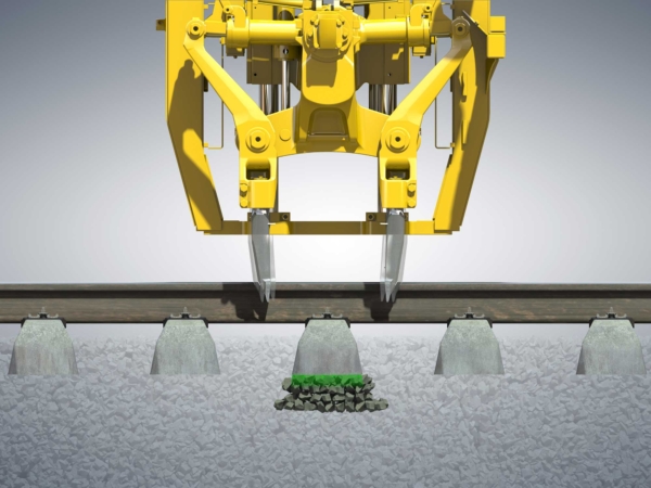 Withdrawing ‒ the vibration during the lifting process ensures that the space occupied by the tamping tines is refilled with ballast.